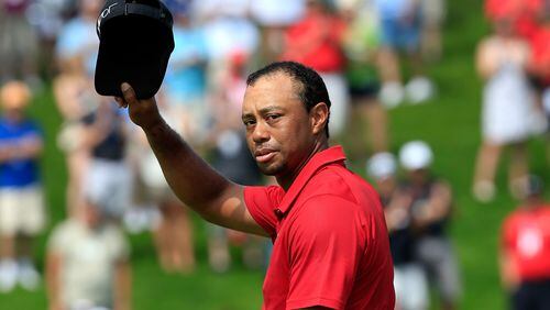 DUBLIN, OH - JUNE 07: Tiger Woods of the United States acknowledges the crowd on the 18th hole during the final round of The Memorial Tournament presented by Nationwide at Muirfield Village Golf Club on June 7, 2015 in Dublin, Ohio. (Photo by Sam Greenwood/Getty Images) *** BESTPIX ***