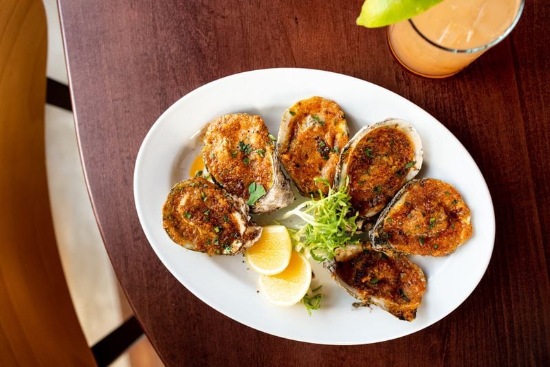 Lagarde American Eatery offers oysters in various ways, including grilled with garlic butter and Parmesan breadcrumbs. CONTRIBUTED BY MIA YAKEL