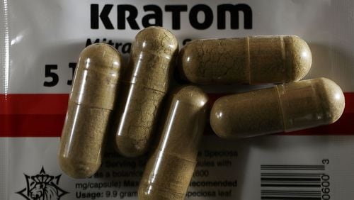 Photo illustration, capsules of the drug kratom