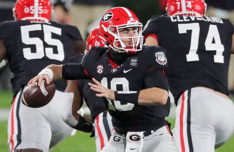 Bulldogs quarterback JT Daniels (18) competes a pass to against the Mississippi State Bulldogs Saturday, Nov. 21, 2020, at Sanford Stadium in Athens. (Curtis Compton / Curtis.Compton@ajc.com)  