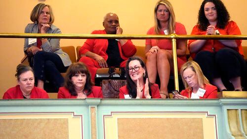 A group of Republican women from throughout the state watch procedures in the Senate chamber at the state Capitol in Jackson, Miss., Thursday, May 2, 2024. (AP Photo/Rogelio V. Solis)