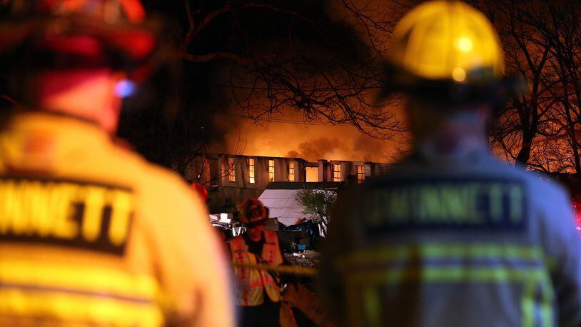 February 10, 2015 Buford: Gwinnett firefighters work at the scene of an old tannery building in Buford Tuesday February 10, 2015. BEN GRAY / BGRAY@AJC.COM