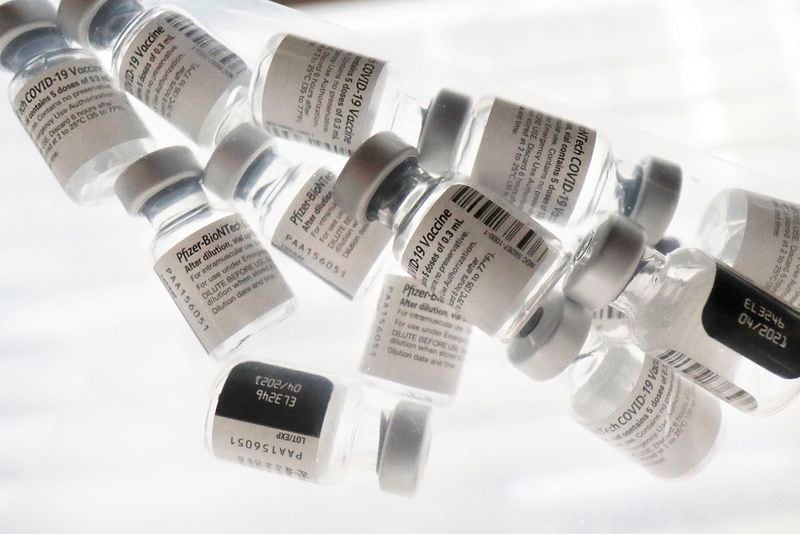 Empty vials of the Pfizer-BioNTech COVID-19 vaccine. (Elizabeth Robertson/The Philadelphia Inquirer/TNS)