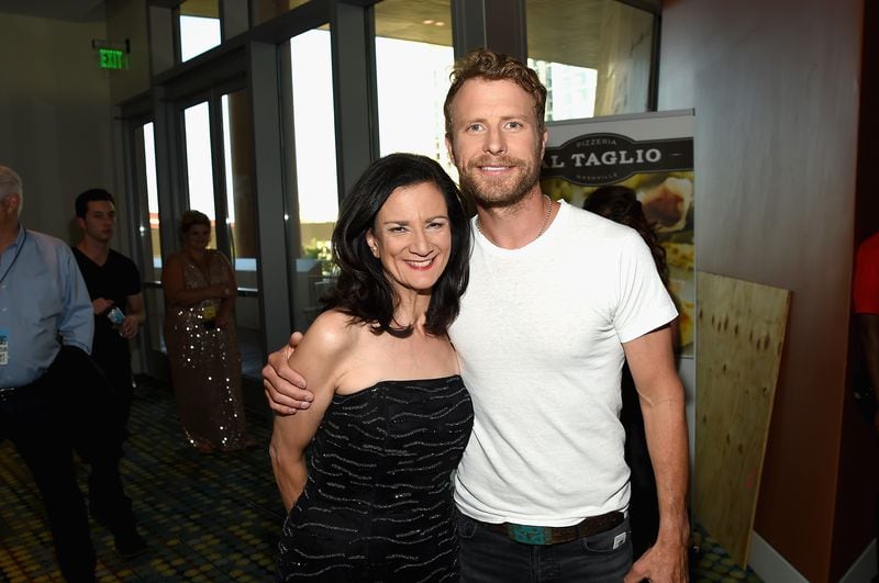 NASHVILLE, TN - JUNE 07: Senior Vice President of Music Strategy for CMT Leslie Fram and Dierks Bentley attend the 2017 CMT Music awards at the Music City Center on June 7, 2017 in Nashville, Tennessee. (Photo by Rick Diamond/Getty Images for CMT)