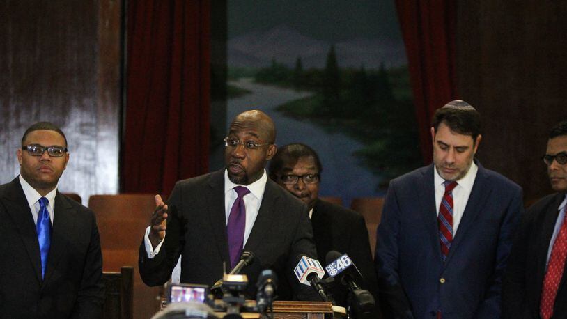 The Rev. Raphael G. Warnock, senior pastor at Ebenezer Baptist Church in Atlanta, addresses the public, along with other Atlanta clergy, to condemn the “vile and racist” remarks made by President Donald Trump at the historic pulpit in Ebenezer Baptist Church in Atlanta, Georgia on Friday, January 12, 2018. (REANN HUBER/REANN.HUBER@AJC.COM)