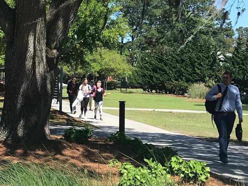 Students walk across the Georgia Southern University campus in Savannah.