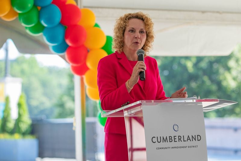 The Executive Director for the Cumberland CID, Kim Menefee, speaks at the unveiling of the Cumberland Hopper in Atlanta on Tuesday, July 25, 2023. (Katelyn Myrick/katelyn.myrick@ajc.com)