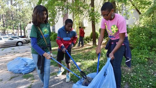 DeKalb County residents are encouraged to help clean up the Scottdale community Saturday morning. AJC file photo