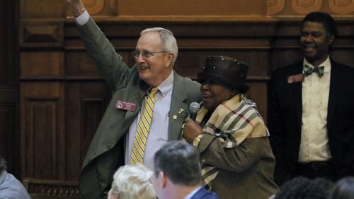 House Rules Chairman John Meadows, left, raises his hand on the 39th day of the 40-day legislative session in March 2017. Meadows, who was first elected to the state House in 2004, died Tuesday morning at age 74. BOB ANDRES /BANDRES@AJC.COM