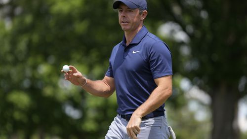 Rory McIlroy, of Northern Ireland, waves after making a putt on the fifth hole during the third round of the Wells Fargo Championship golf tournament at the Quail Hollow Club Saturday, May 11, 2024, in Charlotte, N.C. (AP Photo/Chris Carlson)