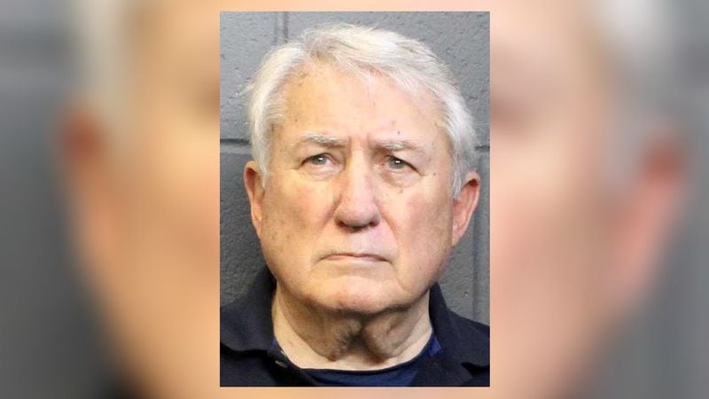 Gus Harter, 80, was being held without bond late Tuesday.