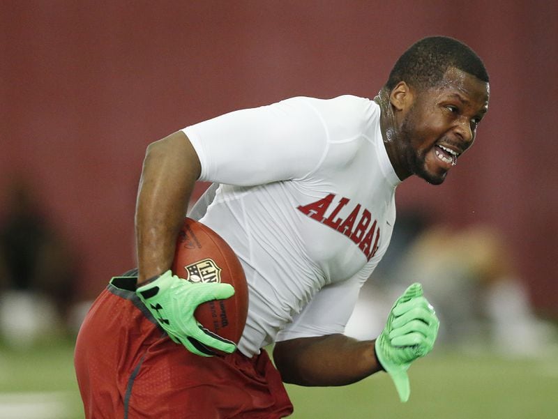 Linebacker Reggie Ragland runs drills during Alabama's NFL football Pro Day, Wednesday, March 9, 2016, in Tuscaloosa, Ala. The event is to showcase players for the upcoming NFL football draft. (AP Photo/Brynn Anderson)