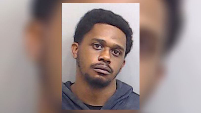 Dehaven Johnson, 28, was being held without bond Friday at the Fulton County jail.