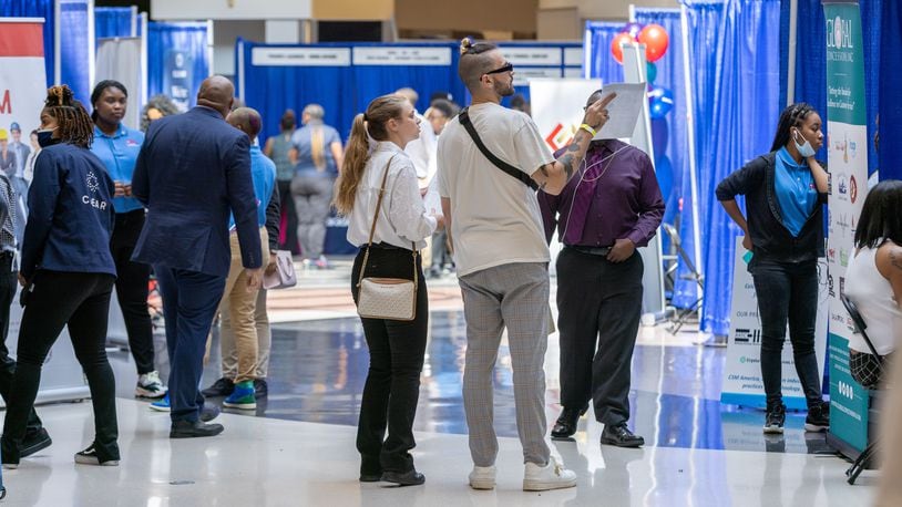 People walk around the  domestic terminal atrium  during the ATL Airport Career Fair at Hartsfield-Jackson Atlanta International Airport on Tuesday, June 14, 2022 (Steve Schaefer / steve.schaefer@ajc.com)