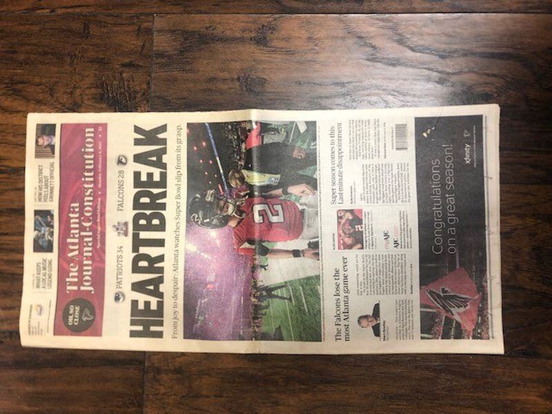 The front page of The Atlanta Journal-Constitution after The Falcons loss 34-28 in Super Bowl LI.
