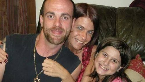 Yoel Robton, left, with his girlfriend Heather Altman and her daughter Chasity Altman. Robton hung himself in the Doraville jail after jailers failed to give him prescribed medication and spot his hours-long preparations on video monitors.