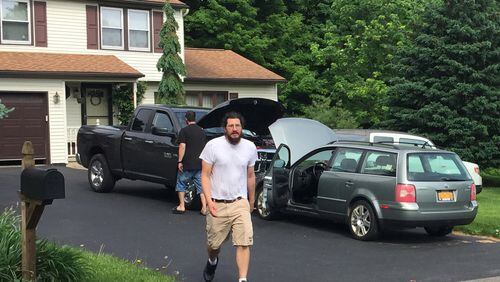 Michael Rotondo, 30, prepares to leave his parents’ house in Camillus, N.Y., on June 1, 2018. Rotondo, whose eviction from his parents’ home drew national attention, finally left that day, hours before a court-ordered deadline. DOUGLASS DOWTY / THE POST-STANDARD VIA AP