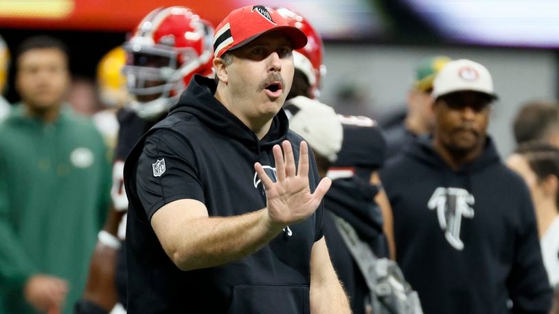 Falcons head coach Arthur Smith gives instructions to his team during warm-ups before the Falcons face the Green Bay Packers on Sunday, Sept. 17, 2023, at Mercedes-Benz Stadium in Atlanta.  Miguel Martinz/miguel.martinezjimenez@ajc.com