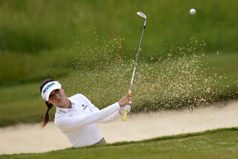 Lydia Ko hits out of the bunker on the 10th green during the first round of the Chevron Championship LPGA golf tournament Thursday, April 18, 2024, at The Club at Carlton Woods, in The Woodlands, Texas. (AP Photo/David J. Phillip)