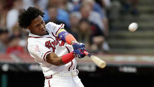 Ronald Acuna Jr., of the Atlanta Braves, hits during the Major League Baseball Home Run Derby, Monday, July 8, 2019, in Cleveland. The MLB baseball All-Star Game will be played Tuesday. (AP Photo/Tony Dejak)