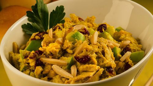 Chicken salad is flavored with a curried mayo dressing and picks up a fresh note from chopped apples. (Chris Walker/Chicago Tribune/TNS)