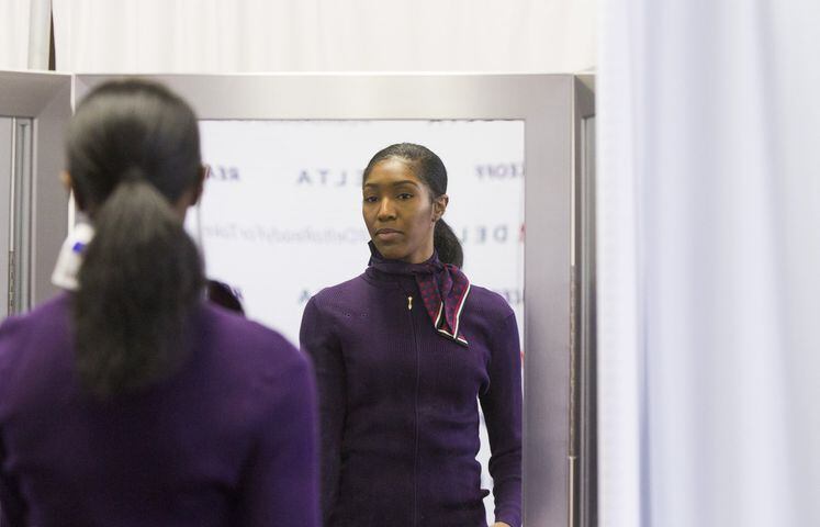 Delta employees putting on purple with new uniform rollout