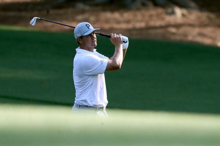 April 7, 2021, Augusta: Bryson DeChambeau hits his second shot on the tenth hole during his practice round for the Masters at Augusta National Golf Club on Wednesday, April 7, 2021, in Augusta. Curtis Compton/ccompton@ajc.com