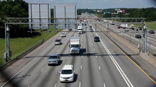 July 15, 2015 - Gwinnett County - I-85 HOT lane tolling equipment includes enforcement cameras, traffic-counting loops buried in the pavement and an antenna. BOB ANDRES / BANDRES@AJC.COM