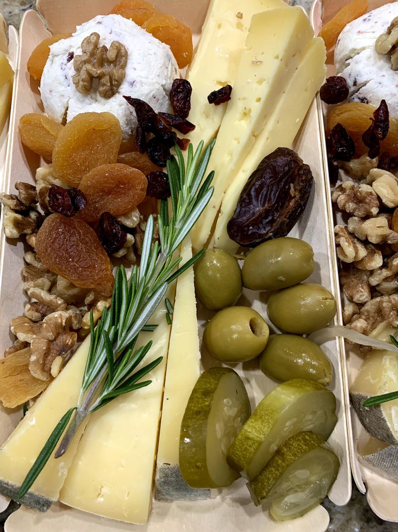 A cheeseboard can be made for individual servings, like this one featuring wedges of Concord tomme and fresh goat’s cheese. Courtesy of CalyRoad 