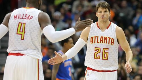 Hawks Paul Millsap gives Kyle Korver five during a 102-98 victory over the Knicks during overtime in a NBA basketball game on Wednesday, Dec. 28, 2016, in Atlanta. Curtis Compton/ccompton@ajc.com