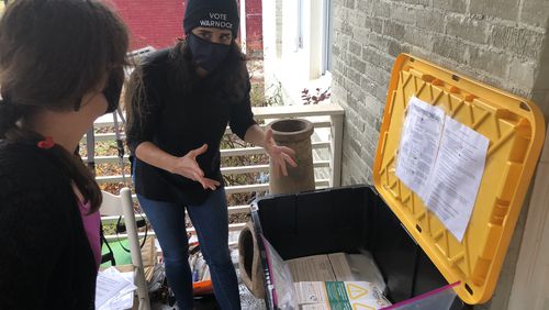 Clara Green, a volunteer with the state Democratic Party, is helping cure rejected mail-in ballots across the metro area. The front porch of her Westview neighborhood home is a hub for other volunteers to pick up materials for the curing effort.