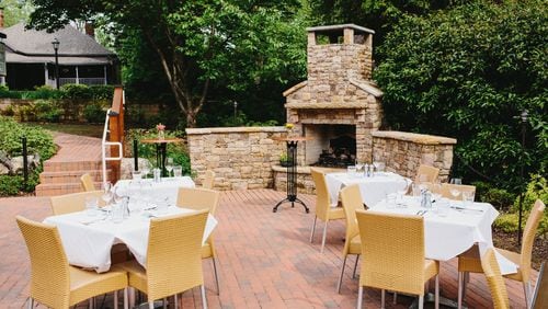 Table & Main is a cozy restored homestead complete with an outdoor fireplace on lively Canton Street in Roswell. CONTRIBUTED BY TABLE & MAIN