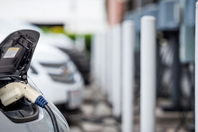 CBRE is partnering with EV+ to install 10,000 electric vehicle charging stations at public places across the country.