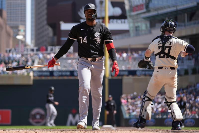 Chicago White Sox designated hitter Eloy Jiménez (74) walks back to the dugout after striking out during the ninth inning of a baseball game against the Minnesota Twins, Thursday, April 25, 2024, in Minneapolis. (AP Photo/Abbie Parr)