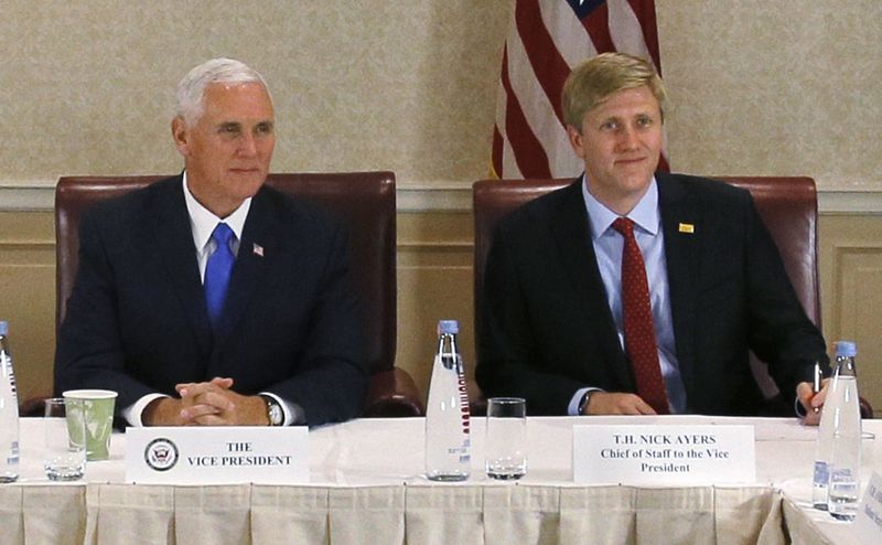  GloriFi, the “anti-woke” bank that Nick Ayers (left) co-founded, has laid off most of its employees and is set to shut down. Ayers is pictured with then Vice President Mike Pence at a 2017 event. (Zurab Kurtsikidze via AP)
