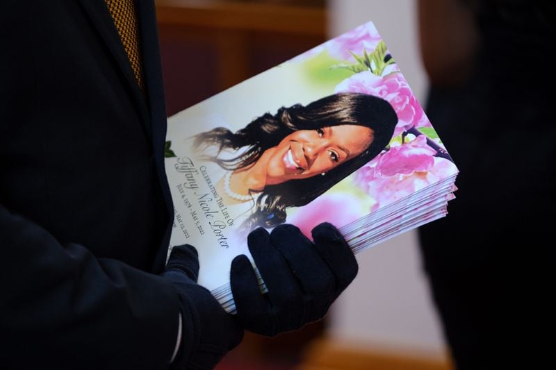 Family and friends mourn Gwinnett County Tax Commissioner Tiffany Porter at her funeral in Atlanta on Thursday, May 12, 2022. Porter, who died of cancer at 43, was the first Black tax commissioner in Gwinnett and previously the first Black judge in Duluth. (Arvin Temkar / arvin.temkar@ajc.com)