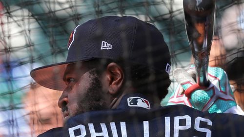 Braves second baseman Brandon Phillips stayed in the game Tuesday after being hit in his problematic left hand/wrist area by a first-inning fastball. (Curtis Compton/AJC file photo)