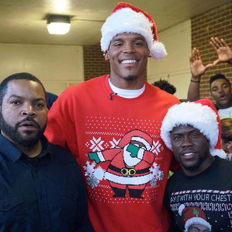 Cam Newton is on top of the world but his Christmas sweater..