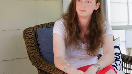 Rose is a transgender student who graduated from Druid Hills HS in May. Sitting on her back porch, she talked about the difficulty of being a transgender student in high school and the challenges ahead. BOB ANDRES / BANDRES@AJC.COM