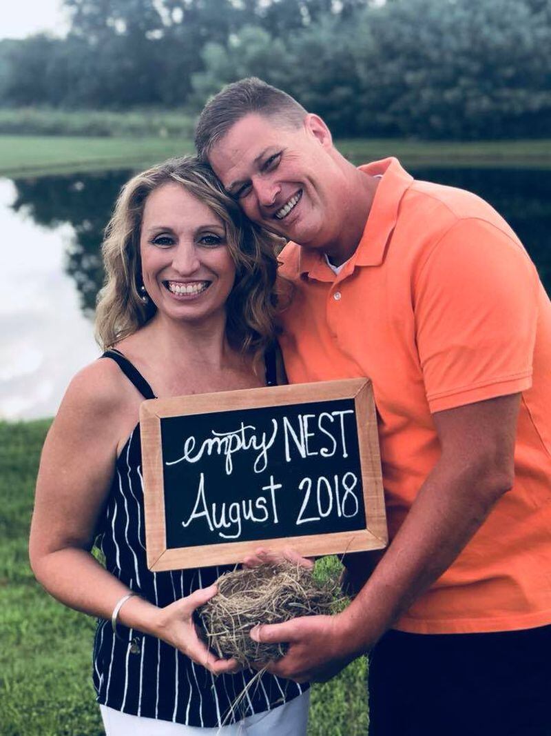 Vicky Piper, left, with her husband, Jeff, pose for a picture honoring their empty nest. The Facebook post generated more than 173,000 reactions.