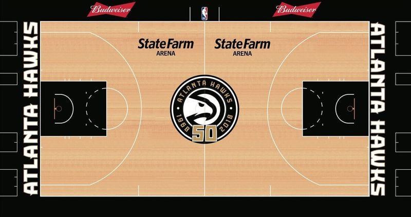 The Hawks unveiled a secondary court featuring gold and black colors that will be used for several games as part of the team’s 50th anniversary celebration. (COURTESY THE ATLANTA HAWKS)