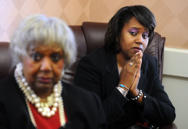 Jan. 3, 2013 Atlanta -- Alvelyn Sanders (right) listens and watches her mother Georgianne Thomas (left) describe the first time she ever saw the Ku Klux Klan in the 1960s Thursday, Jan. 3, 2013, at Spelman College in Atlanta. "Foot Soldiers: Class of 1964" is an independent documentary about a group of Spelman College women who, as college freshmen, participated in the largest coordinated series of civil rights protests in Atlanta's history. The documentary was produced and directed by Sanders. BITA HONARVAR / BHONARVAR@AJC.COM