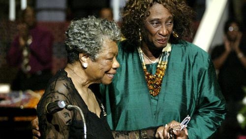 Poet Maya Angelou (left) receives a hug from the Rev. Barbara L. King on Sunday at Hillside International Truth Center in Atlanta in this 2007 file photo. The occasion was the 36th anniversary of the center, which was founded by King. King died Sunday at her home after an illness. She was 90.