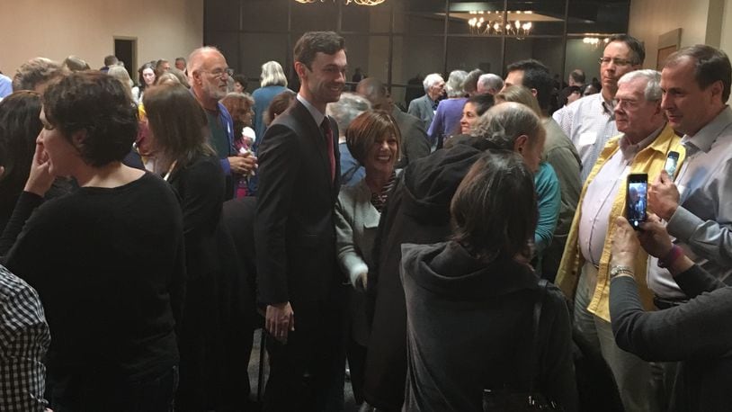 Democrat Jon Ossoff greets voters in Dunwoody. AJC/Greg Bluestein