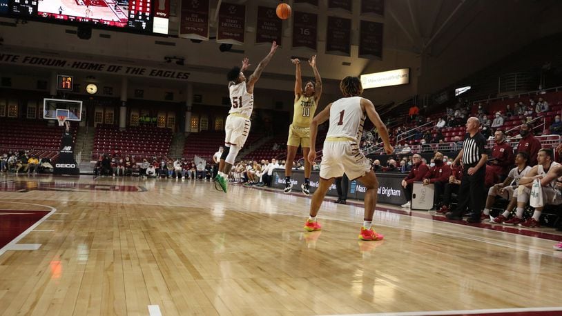 Georgia Tech guard Tristan Maxwell (shooting) attempts a 3-pointer against Boston College at Conte Forum Jan. 12, 2021. Maxwell scored a career-high 22  points for the Yellow Jackets. (Keith Swindell)