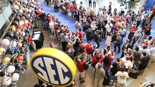 Alabama head coach Nick Saban arrives for his SEC Media Days press conference with Alabama fans lining the carpet at the College Football Hall of Fame Wednesday, July 18, 2018, in Atlanta.