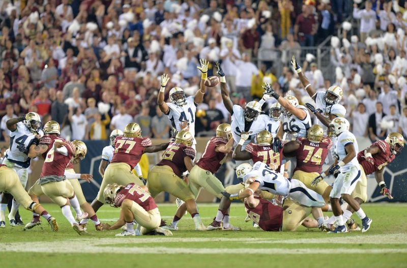 October 24, 2015 Atlanta - Florida State Seminoles place kicker Roberto Aguayo's field goal is blocked by Georgia Tech Yellow Jackets at the end of the fourth quarter at Bobby Dodd Stadium on Saturday, October 24, 2015. Georgia Tech Yellow Jackets won 22 - 16 against the Florida State Seminoles. HYOSUB SHIN / HSHIN@AJC.COM