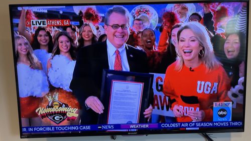 Good Morning America co-host Amy Robach (R) was surprised by UGA President Jere Morehead on live television with a proclamation declaring Friday, Oct. 14, 2022, 'Amy Robach Day' at UGA. Robach is a 1995 graduate of UGA's college of broadcast journalism. (Photo by Chip Towers/ctowers@ajc.com)