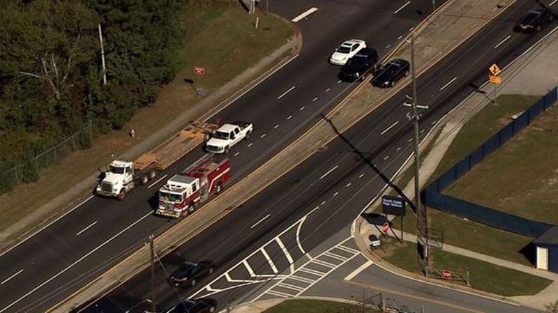 A vehicle hit a 16-year-old South Cobb High School student as he tried to cross the street Tues., Oct. 20, 2015. (Credit: Channel 2 Action News)
