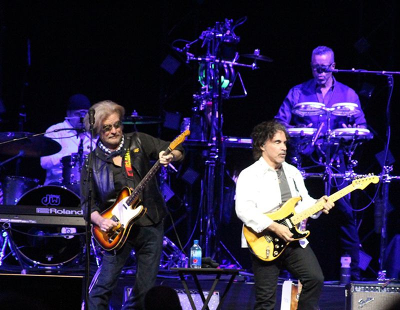 Hall and Oates share a guitar solo. Photo: Melissa Ruggieri/AJC